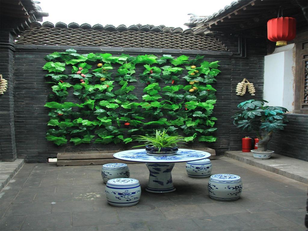 Pingyao Yiguan Folk Custom Inn Ruang foto